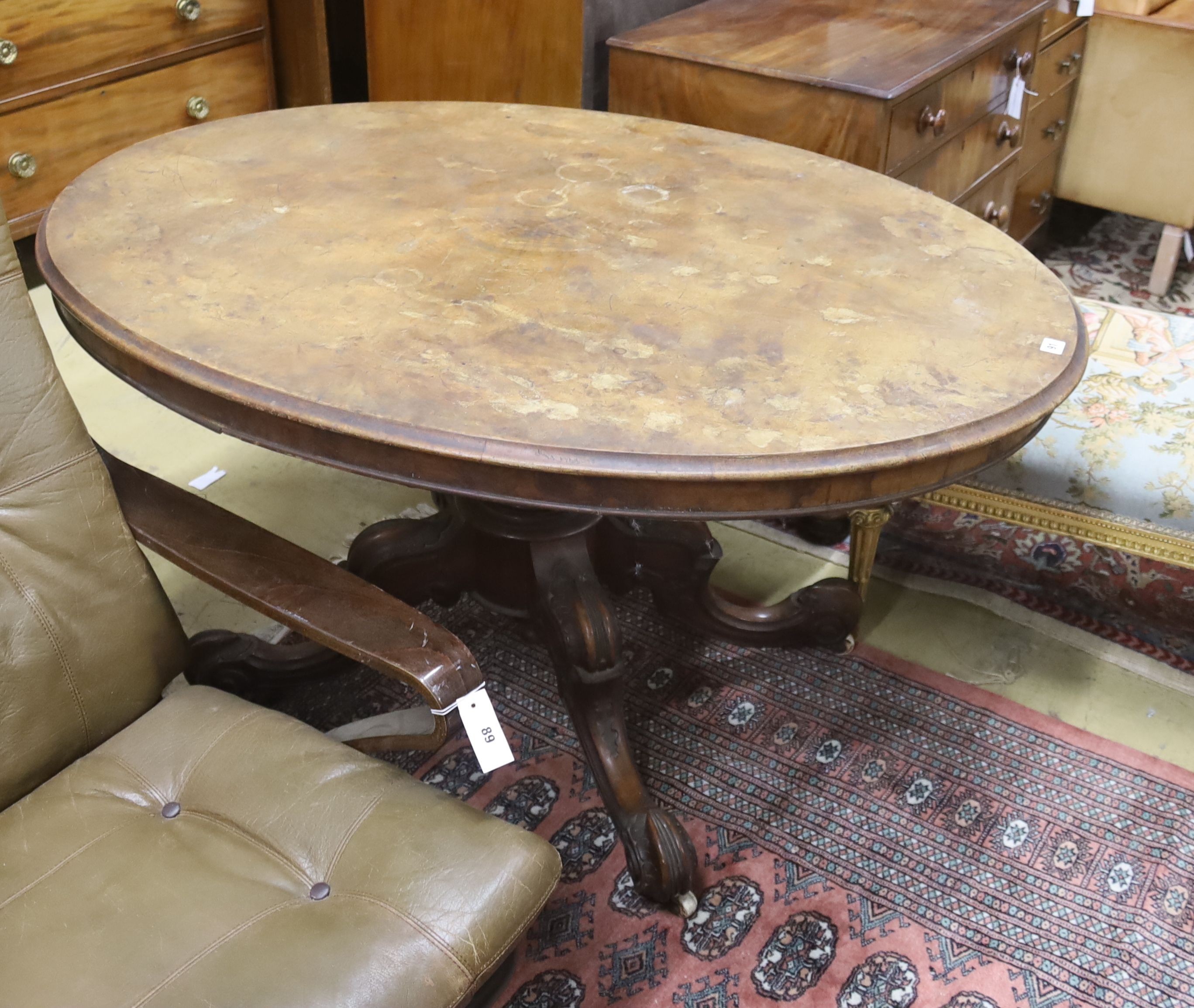 A Victorian oval figured walnut tilt top loo table, width 135cm, depth 100cm, height 72cm